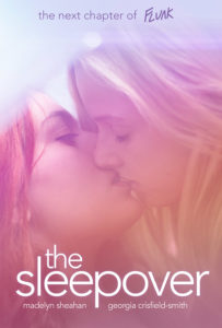 Tabby and Heidi kissing in bed